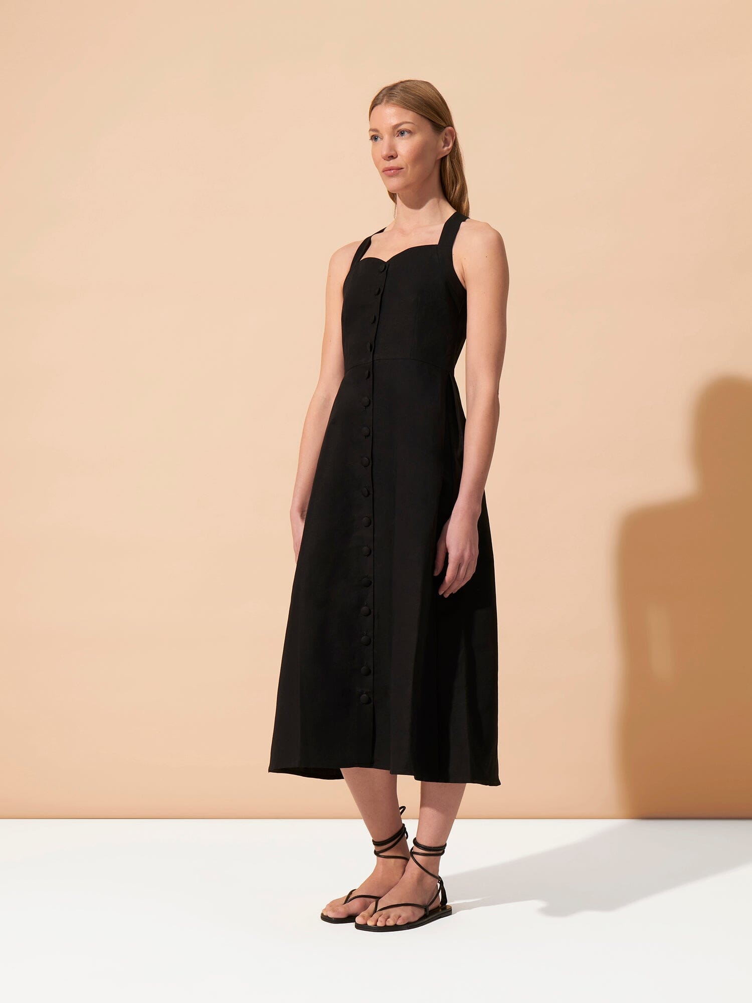 LINDA - High-waisted flared button midi dress with crossed straps in Linen  Cotton  Black Dress Fête Impériale