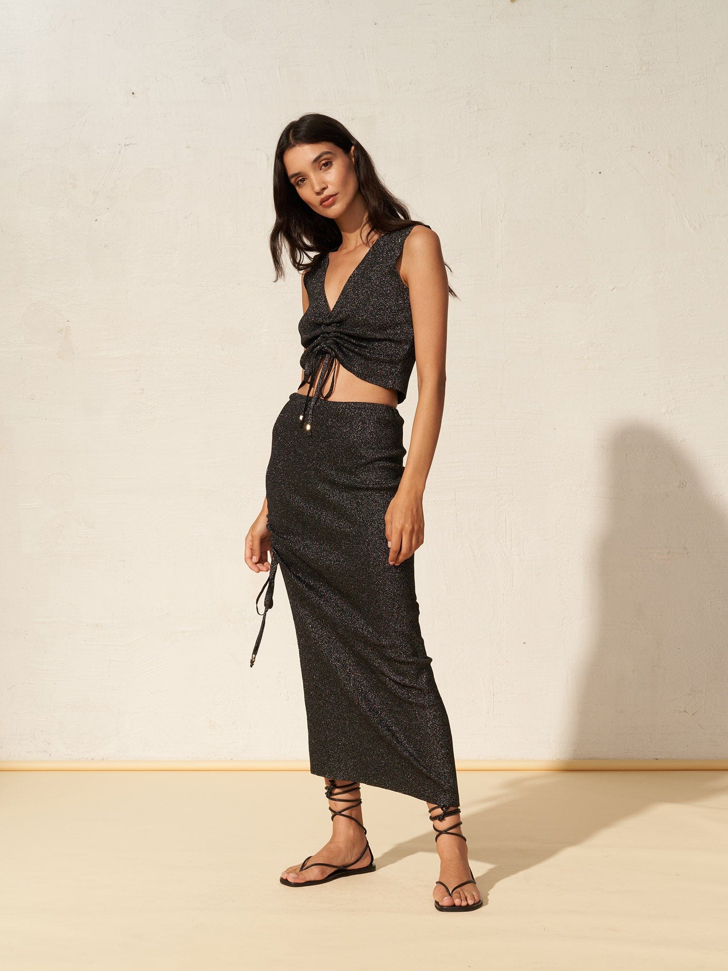 LIZA - Slit midi skirt with adjustable length in Oeko-Tex sequined knit Black Skirt Fête Impériale