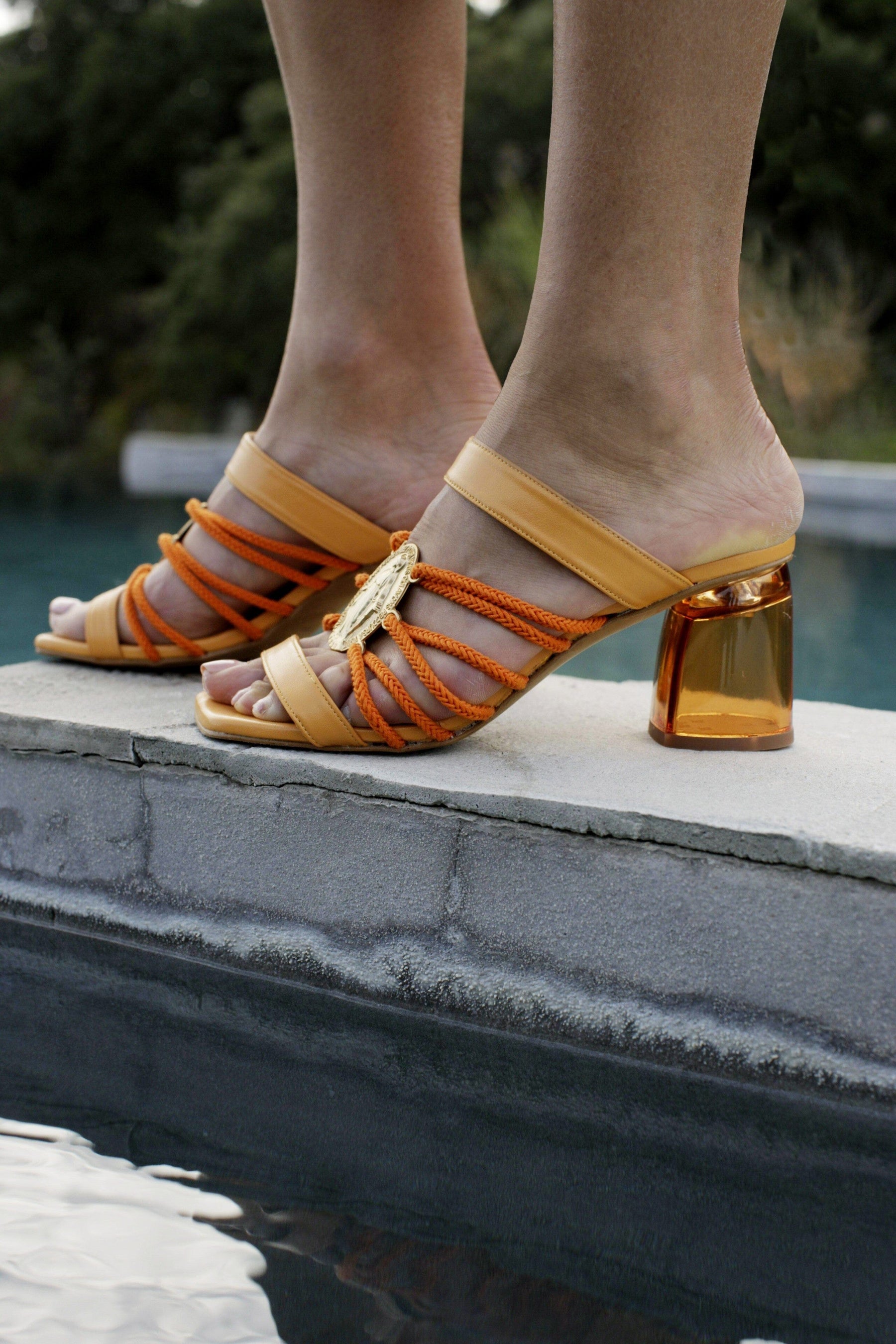 Heeled mules with straps and medallion Vierge Miraculeuse orange Shoes Fête Impériale