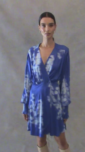 CHLORIS - Abstract Dazzling Blue/Ice Melt printed FSC viscose satin wrap dress with long sleeves and smocked cuffs