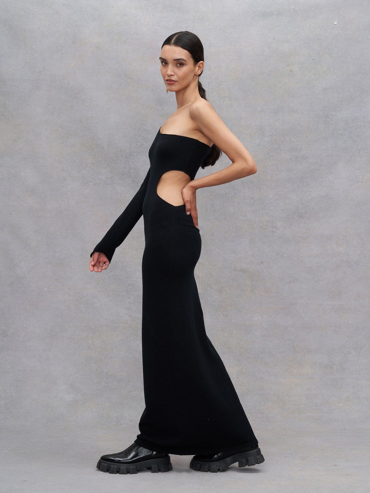 PROPRIANO - Asymmetrical openwork long dress in Oeko Tex merino wool Black Dress Fête Impériale