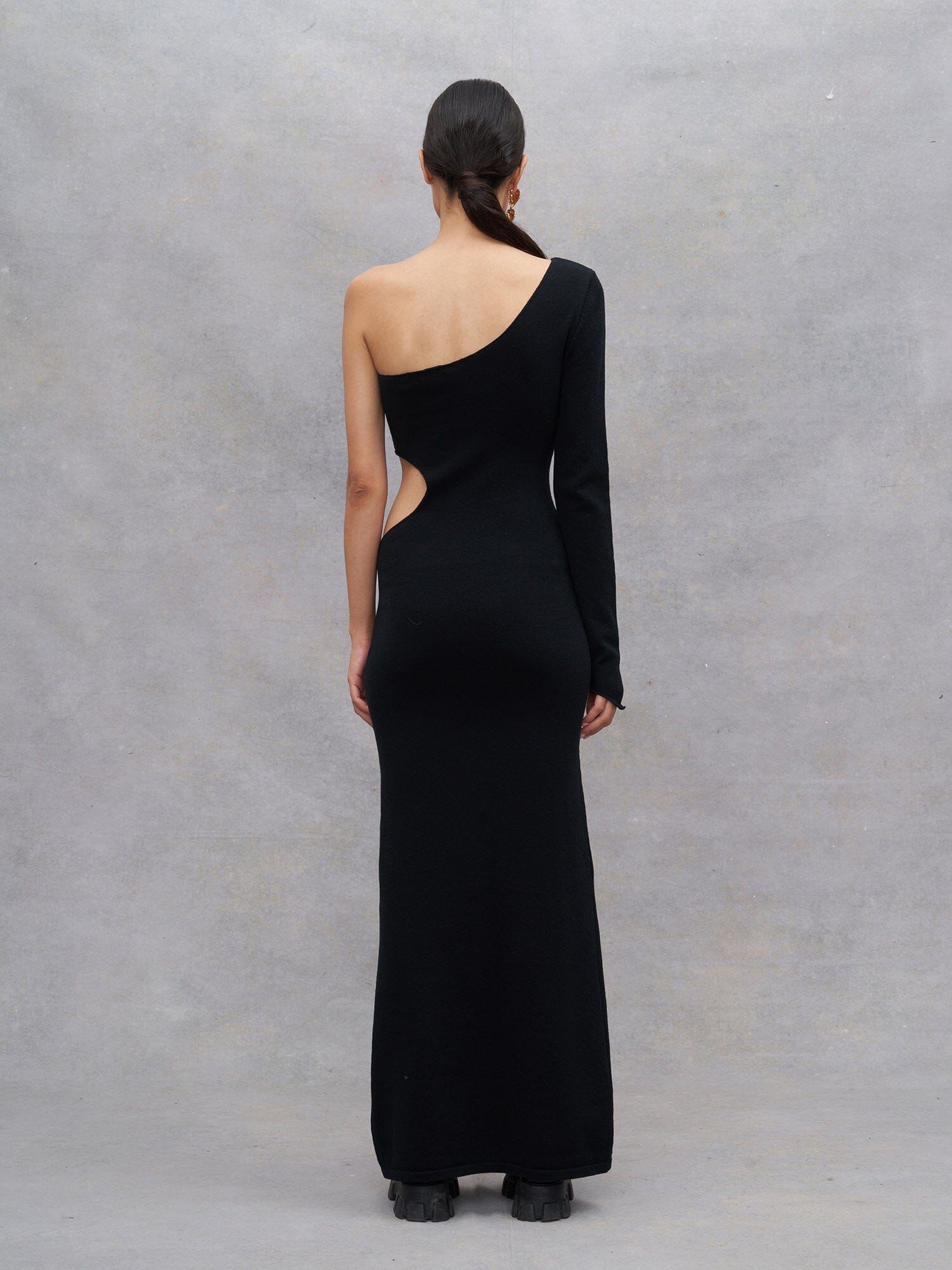 PROPRIANO - Asymmetrical openwork long dress in Oeko Tex merino wool Black Dress Fête Impériale