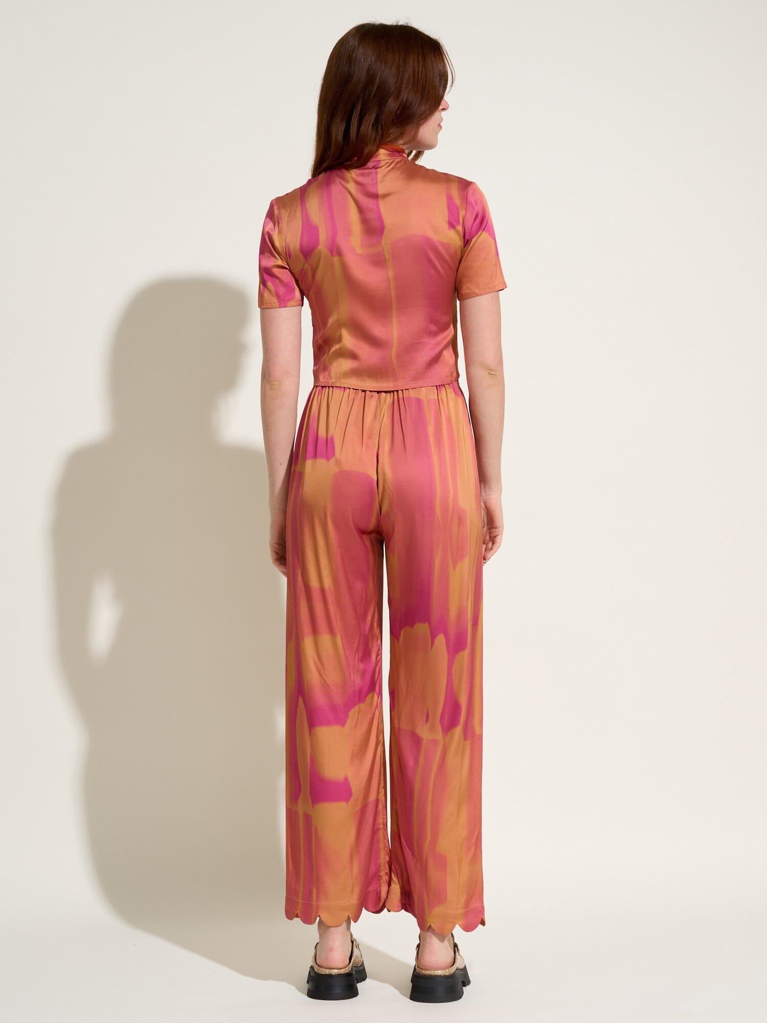 SIFNOS - Tie & Dye Fuchsia Printed Viscose Satin Wide Leg Pants with Elasticated Bottom and Petal Detail Pants Fête Impériale